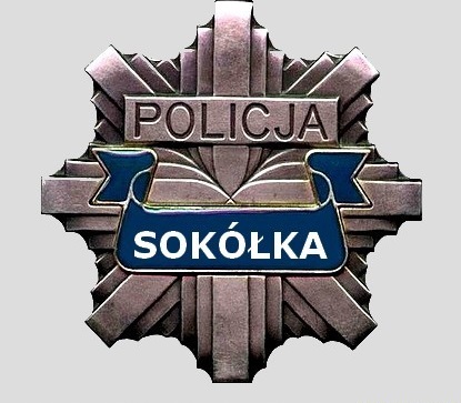 Na grafice znajduje się policyjna &quot;gwiazda&quot; (odznaka służbowa) z napisem POLICJA, a pod nim SOKÓŁKA.