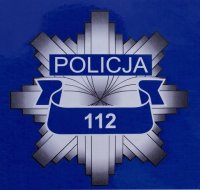 Gwiazda policji, na niebieskim tle z numerem alarmowym 112.