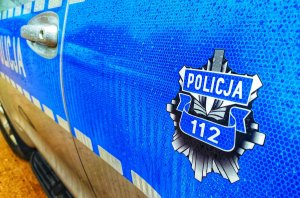 boczne drzwi radiowozu z numerem 112