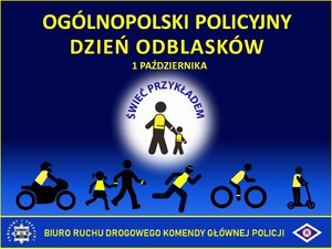 Żółty napis na niebieskim tle &quot;Ogólnopolski policyjny dzień odblasków&quot;.