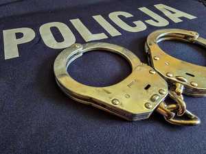 Napis policja i kajdanki